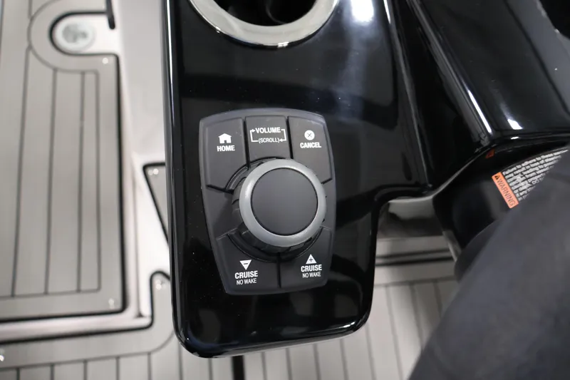Slide: The Image of Control panel of 2026 Yamaha Boats 222S featuring cruise and volume buttons. - 20