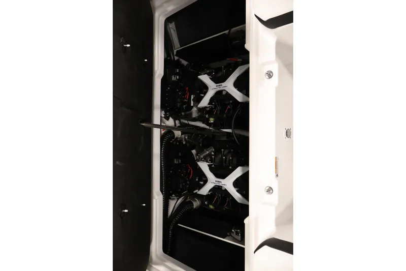 Slide: The Image of Engine compartment of 2026 Yamaha Boats 222S, showcasing dual engines and components. - 30