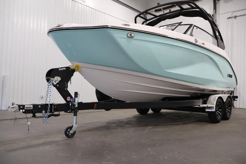 Slide: The Image of 2026 Yamaha Boats 222S on trailer in indoor showroom setting. - 36