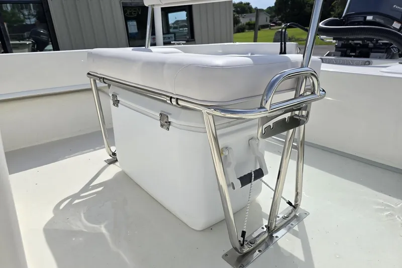 Slide: The Image of 2025 Sundance B20CCR boat with cushioned seating and stainless steel frame. - 4