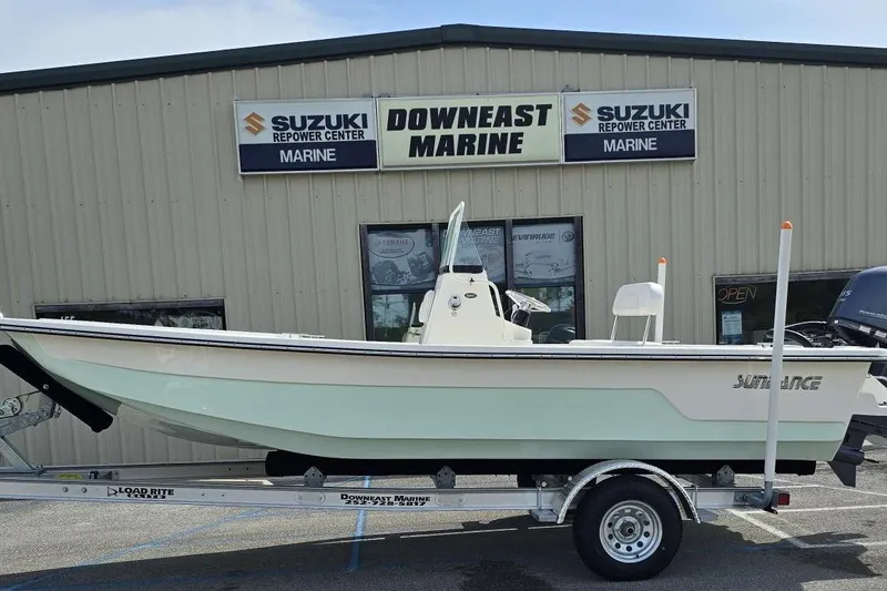 Slide: The Image of 2025 Sundance B20CCR boat on trailer at Downeast Marine dealership. - 9