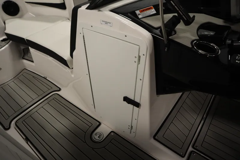 Slide: The Image of 2026 Yamaha Boats 222SD interior with sleek seating and modern flooring design. - 16