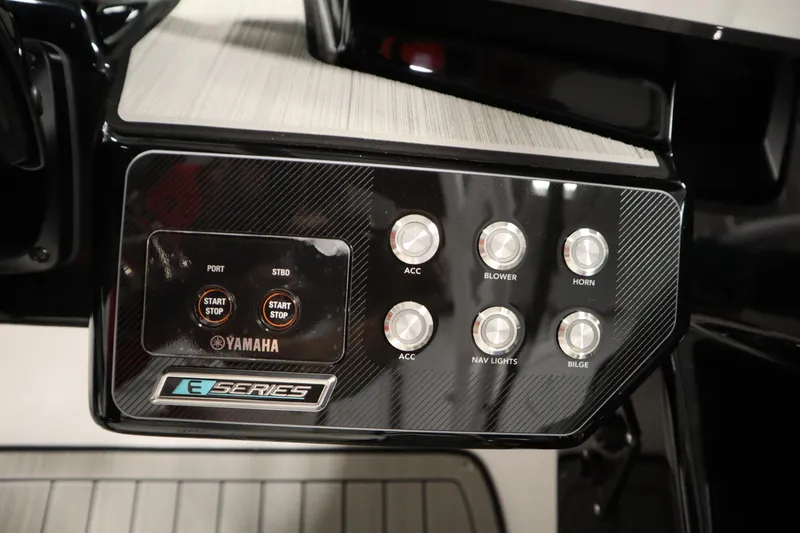 Slide: The Image of Control panel of 2026 Yamaha Boats 222SD, featuring start/stop buttons and accessory controls. - 24