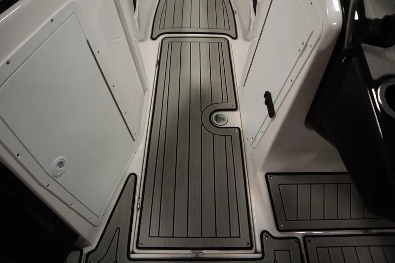 Slide: The Image of 2026 Yamaha Boats 222SD interior deck with sleek, modern design and durable flooring. - 28