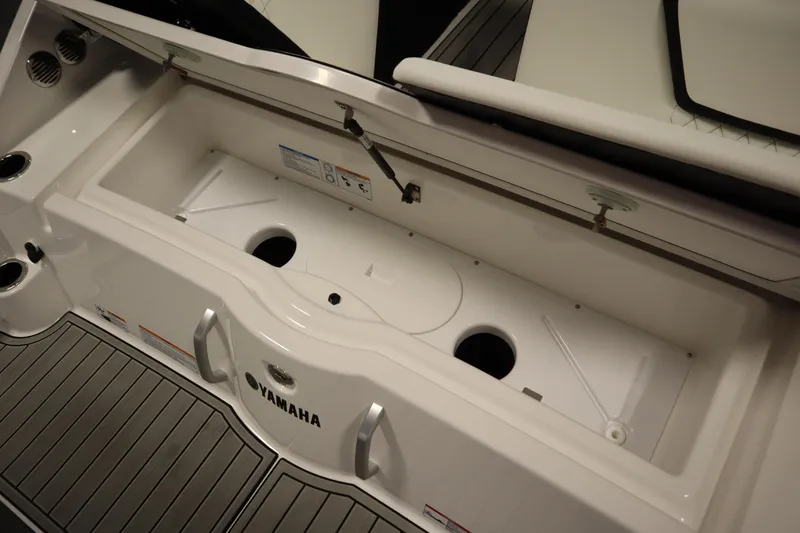 Slide: The Image of 2026 Yamaha Boats 222SD storage compartment with sleek design and durable materials. - 41
