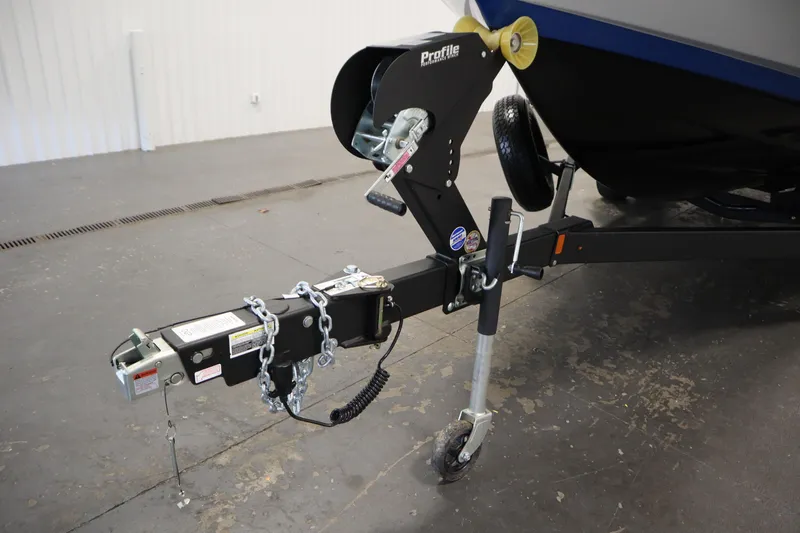 Slide: The Image of Trailer hitch of 2026 Yamaha Boats 222SD, featuring secure chains and wheel support. - 44