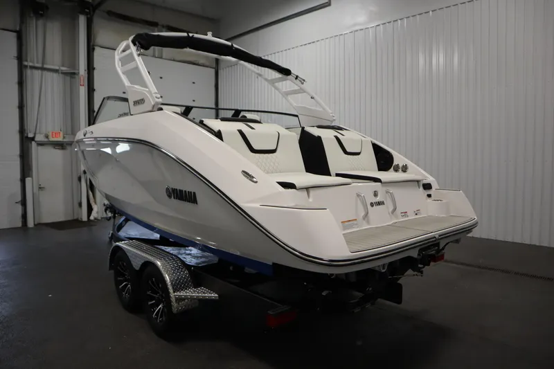 Slide: The Image of 2026 Yamaha Boats 222SD in a showroom, showcasing sleek design and modern features. - 6