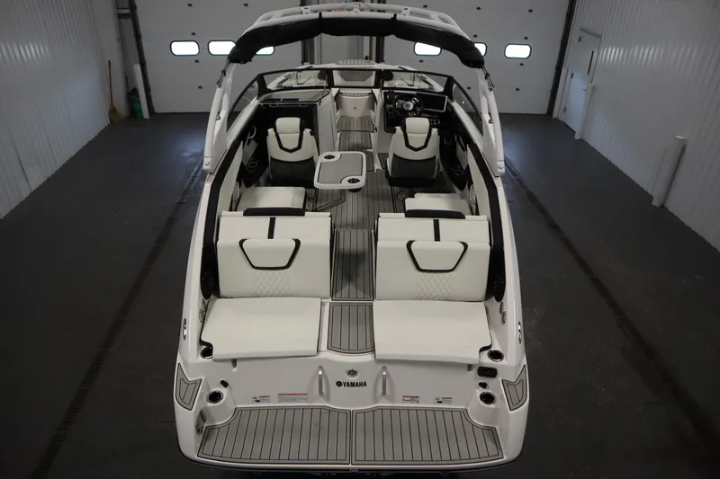 Slide: The Image of 2026 Yamaha Boats 222SD interior, featuring sleek seating and modern design in a spacious layout. - 9