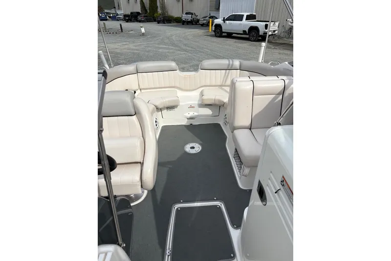 Slide: The Image of 2009 Yamaha Boats SX230 HO interior with spacious seating and modern design. - 12