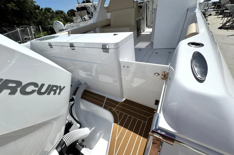 Slide: The Image of 2026 Southport 33 DC boat interior with Mercury engine, showcasing sleek design and modern features. - 6