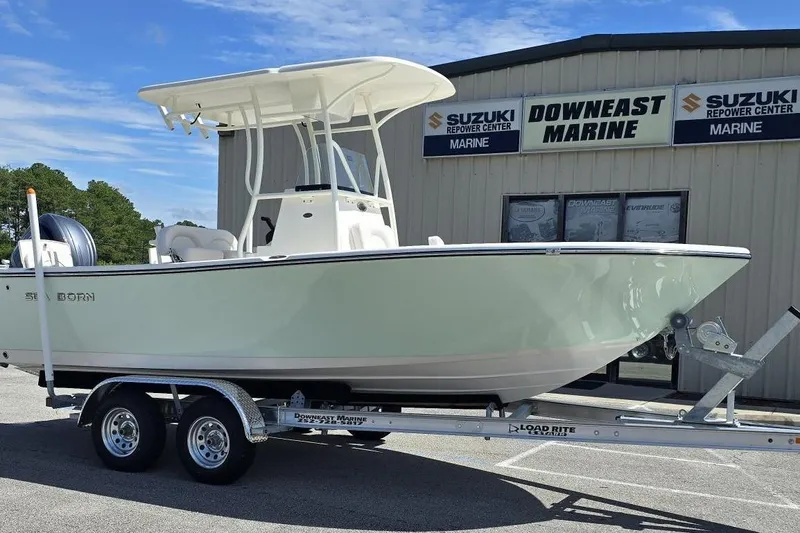 The Image of 2026 Sea Born LX21 Center Console boat on trailer at Downeast Marine. - 1