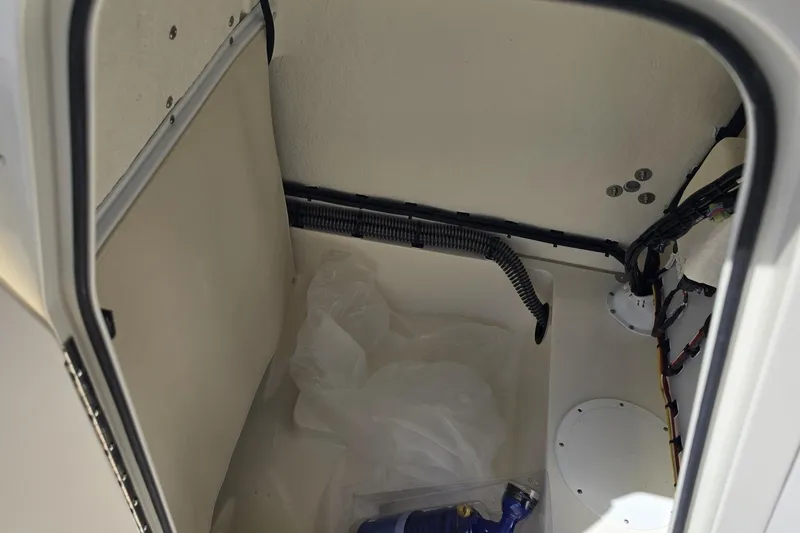 Slide: The Image of Interior view of 2026 Sea Born LX21 Center Console boat compartment. - 12