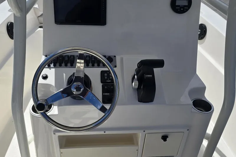 Slide: The Image of 2026 Sea Born LX21 Center Console dashboard with steering wheel and controls. - 9