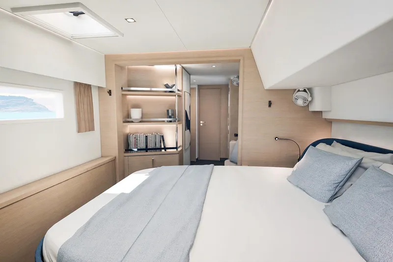 Slide: The Image of Luxurious interior of 2026 Fountaine Pajot 55 yacht with modern design and cozy seating. - 23