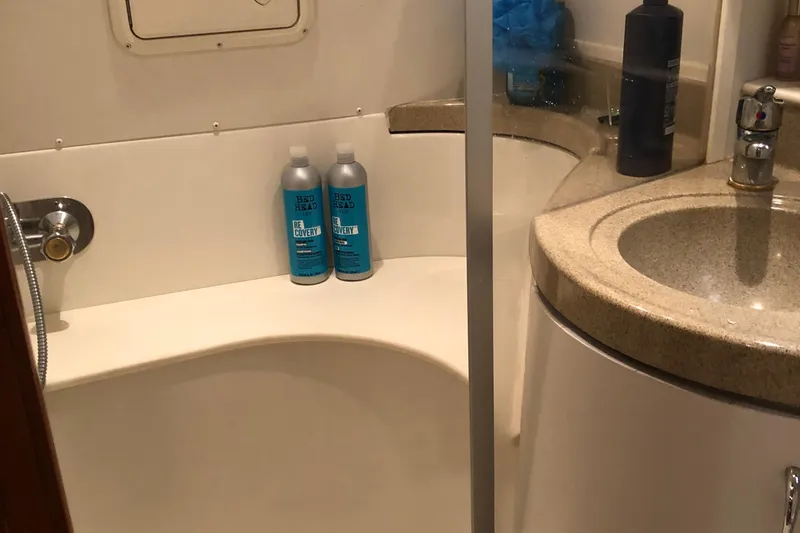 Slide: The Image of Bathroom interior of 2004 Carver 366 Motor Yacht with shower and toiletries. - 15