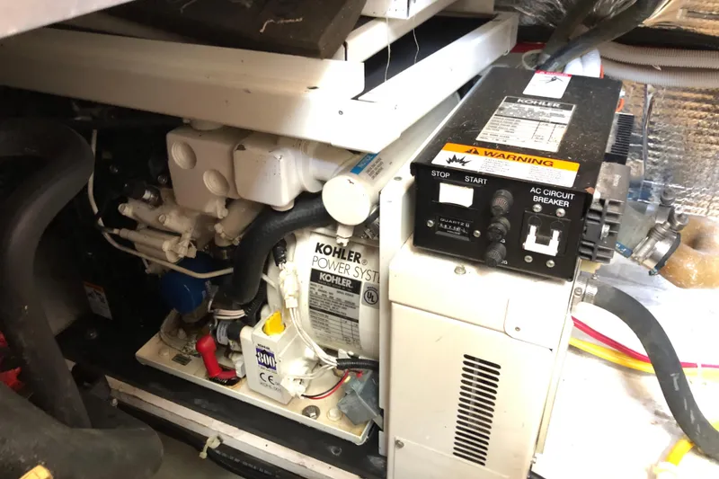 Slide: The Image of Engine room of 2004 Carver 366 Motor Yacht with Kohler power system. - 19