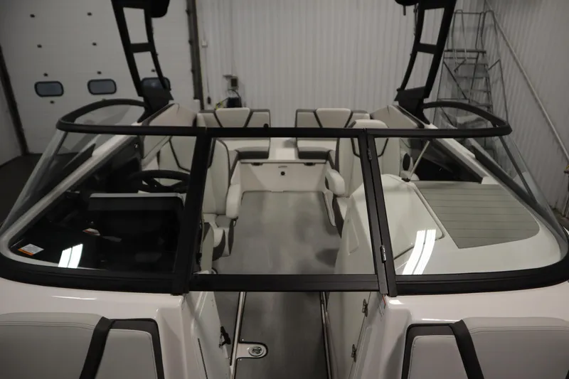 Slide: The Image of 2026 Yamaha Boats AR250 interior view, showcasing sleek seating and modern design. - 16