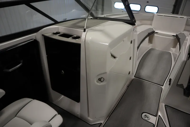 Slide: The Image of 2026 Yamaha Boats AR250 interior with sleek seating and modern design. - 30