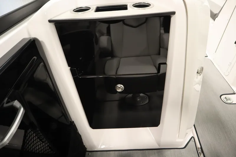 Slide: The Image of 2026 Yamaha Boats AR250 interior with seating and storage compartment. - 31