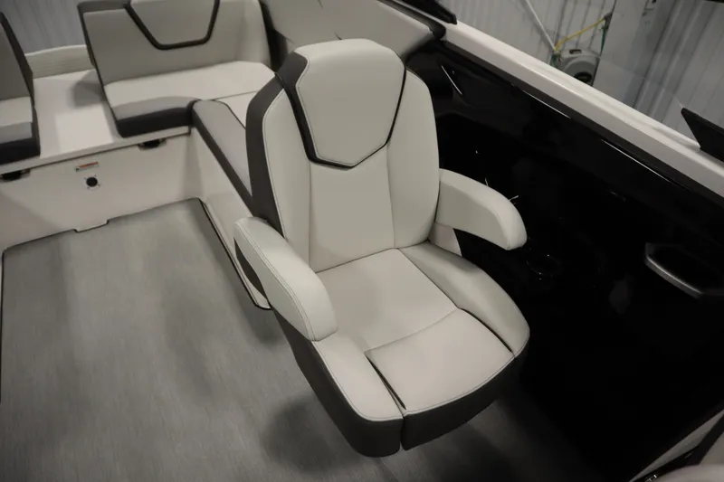 Slide: The Image of 2026 Yamaha Boats AR250 interior with sleek, modern seating design. - 32