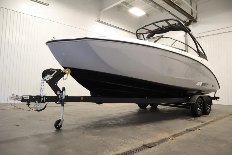 Slide: The Image of 2026 Yamaha Boats AR250 on trailer in indoor showroom setting. - 47