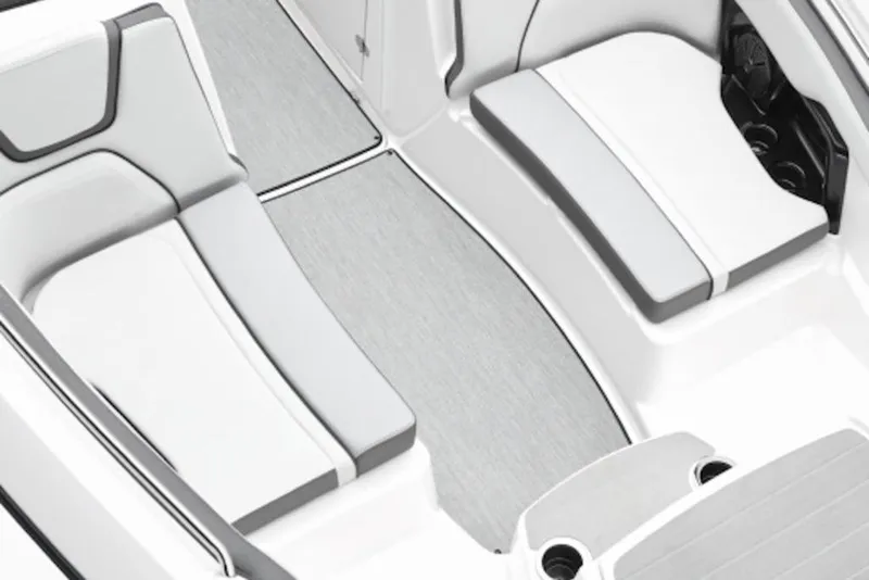 Slide: The Image of Interior seating of 2026 Yamaha Boats AR250, featuring sleek white and gray design. - 55