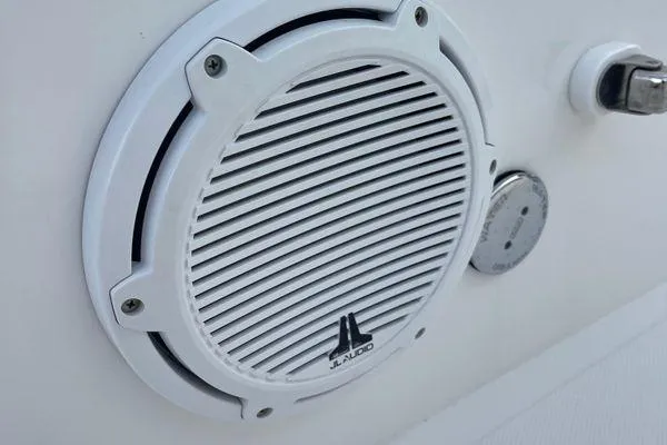 Slide: The Image of White JL Audio speaker on 2013 Bahama 41 Open Fisherman boat. - 18