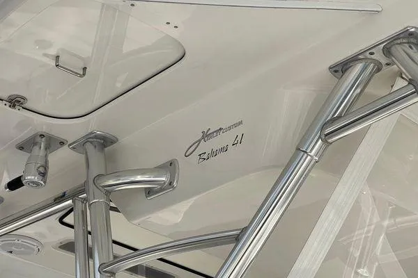 Slide: The Image of 2013 Bahama 41 Open Fisherman boat with stainless steel fittings and sleek design. - 8