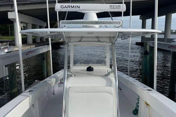 Slide: The Image of 2013 Bahama 41 Open Fisherman boat docked, featuring Garmin xHD2 radar. - 9