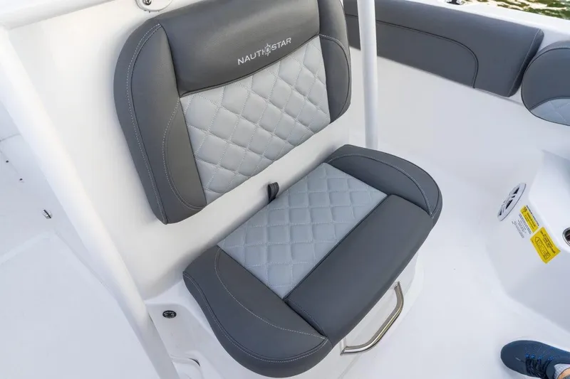 Slide: The Image of 2026 NauticStar 231 Hybrid boat seat with gray quilted upholstery. - 7