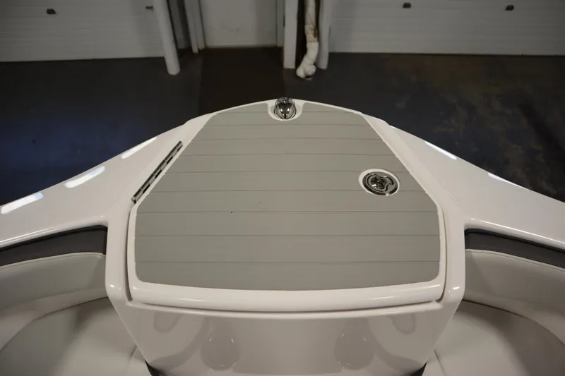 Slide: The Image of 2026 Yamaha Boats AR250 bow area with sleek design and modern features. - 11