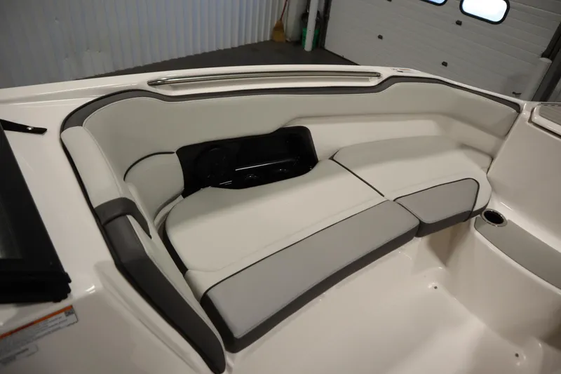 Slide: The Image of 2026 Yamaha Boats AR250 interior seating with sleek, modern design and comfortable upholstery. - 13
