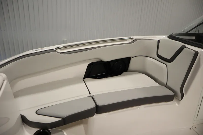 Slide: The Image of 2026 Yamaha Boats AR250 interior seating with sleek, modern design and comfortable upholstery. - 14