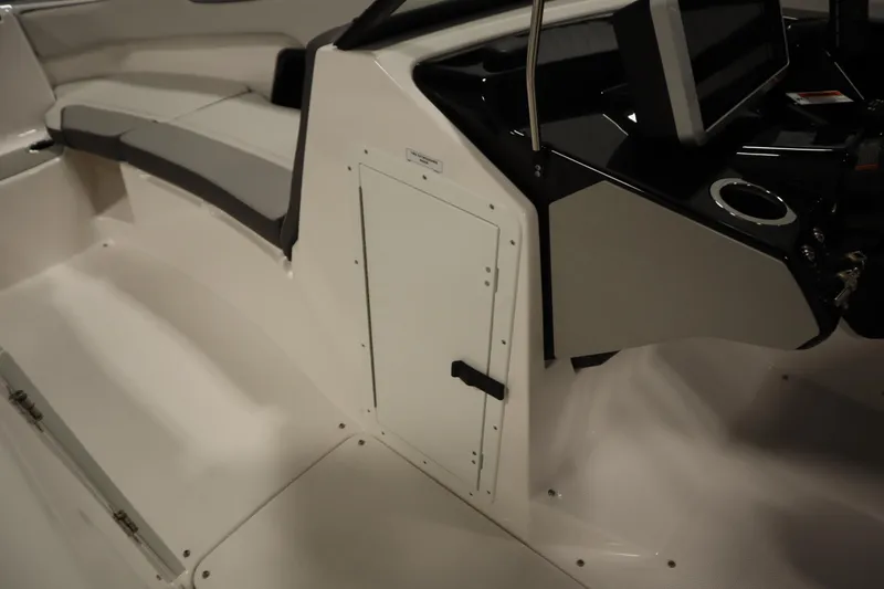Slide: The Image of 2026 Yamaha Boats AR250 interior with seating and control panel. - 29