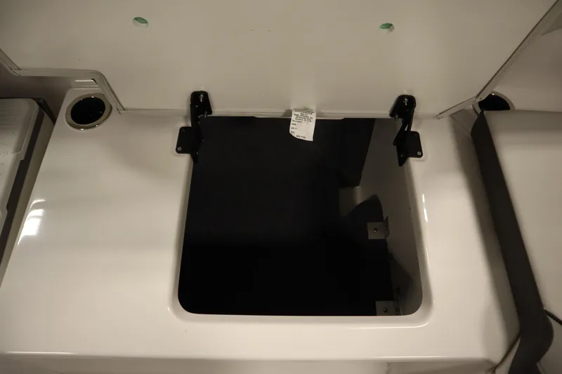 Slide: The Image of Open storage compartment on 2026 Yamaha Boats AR250. - 37