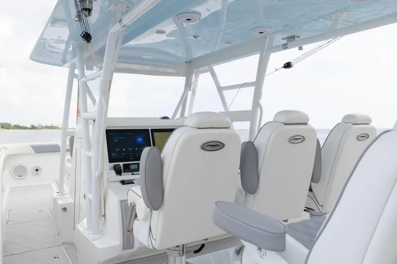 Slide: The Image of 2022 Invincible 46 Catamaran interior with modern helm and luxurious seating. - 20