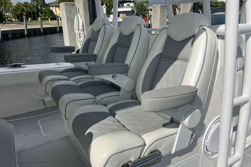 Slide: The Image of Luxury seating on 2022 Invincible 46 Catamaran, featuring plush, ergonomic design. - 23