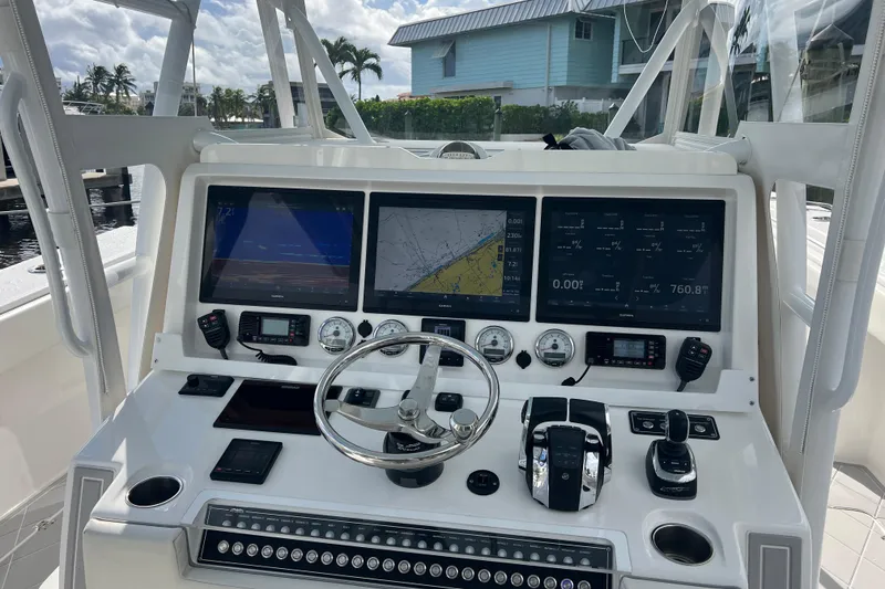 Slide: The Image of Helm of 2022 Invincible 46 Catamaran with advanced navigation and control systems. - 34