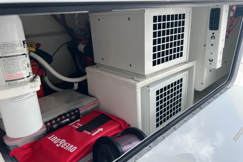 Slide: The Image of Storage compartment of 2022 Invincible 46 Catamaran with equipment and safety gear. - 35