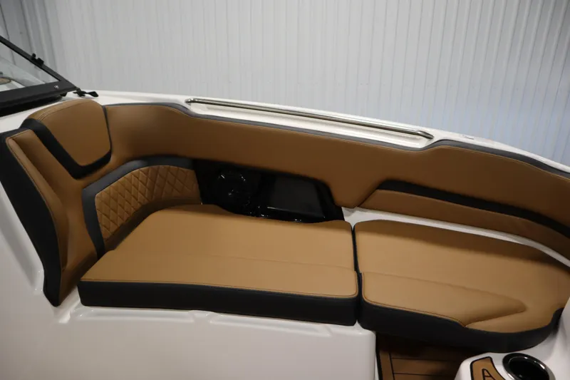Slide: The Image of Luxurious seating in 2026 Yamaha Boats 252SD, featuring tan and black upholstery. - 13