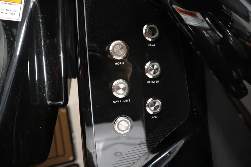 Slide: The Image of Control panel of 2026 Yamaha Boats 252SD with labeled buttons for various functions. - 23