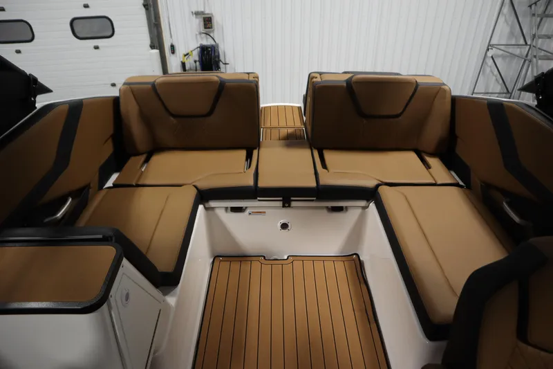 Slide: The Image of 2026 Yamaha Boats 252SD interior with tan seating and sleek design. - 32