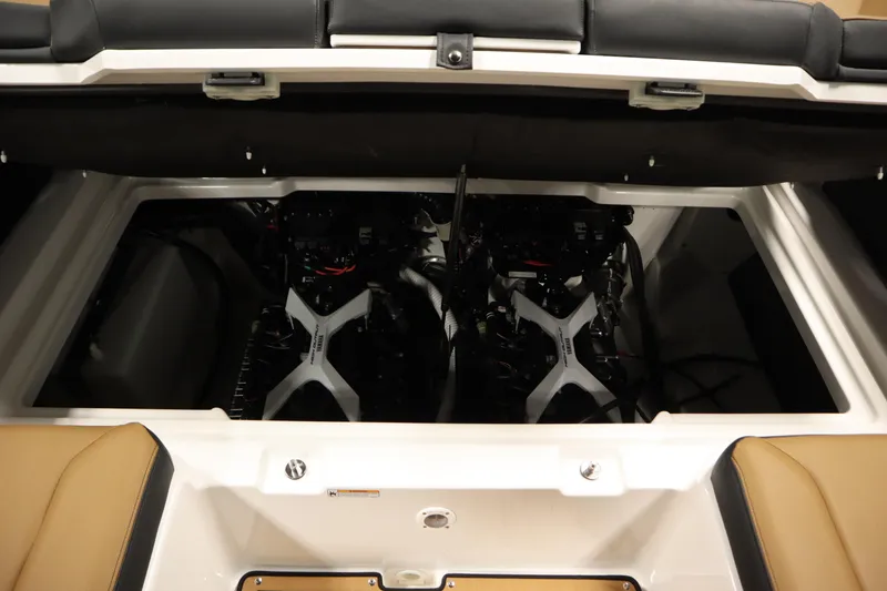 Slide: The Image of 2026 Yamaha Boats 252SD engine compartment with dual engines, open hatch view. - 34