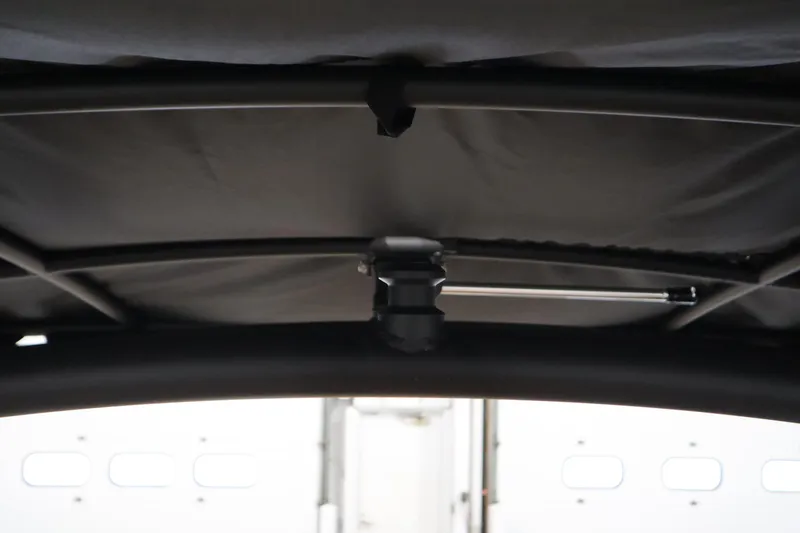 Slide: The Image of Interior view of 2026 Yamaha Boats 252SD canopy structure. - 38