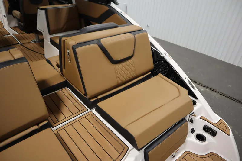 Slide: The Image of Luxurious interior of 2026 Yamaha Boats 252SD with tan leather seating and sleek design. - 40