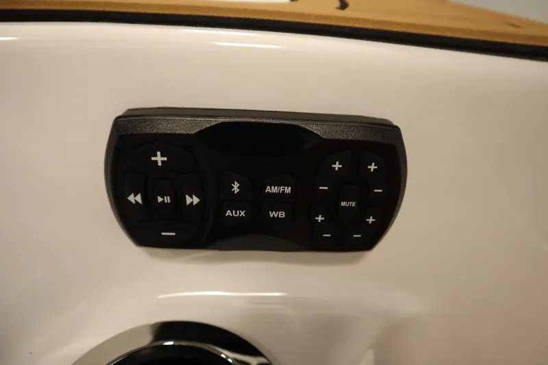 Slide: The Image of Control panel on 2026 Yamaha Boats 252SD, featuring audio and Bluetooth functions. - 42