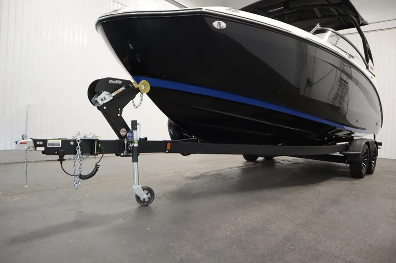 Slide: The Image of 2026 Yamaha Boats 252SD on trailer in indoor storage facility. - 46