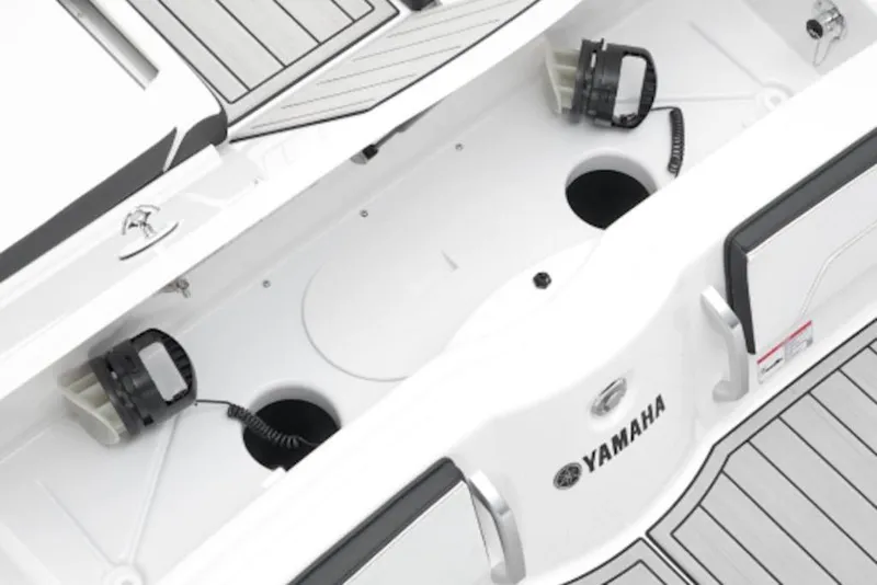 Slide: The Image of 2026 Yamaha Boats 252SD interior with sleek design and integrated cup holders. - 49