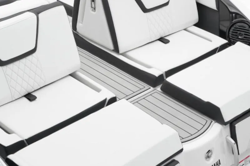 Slide: The Image of Luxury seating on 2026 Yamaha Boats 252SD, featuring sleek white upholstery and modern design. - 51