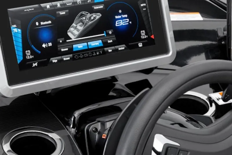 Slide: The Image of Dashboard of 2026 Yamaha Boats 252SD with digital display and steering wheel. - 52